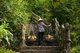 Vietnam: A coconut vendor climbs the stairs at the Marble Mountains, near Danang